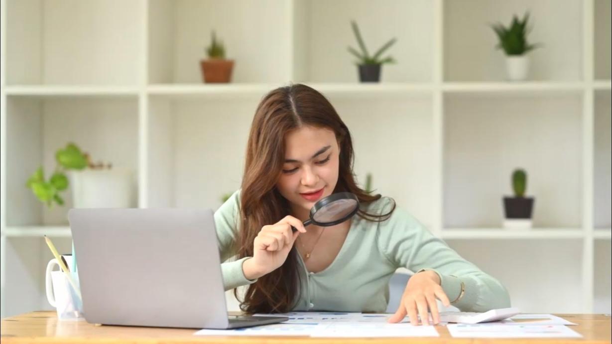 Modern workspace with financial planning tools and technology